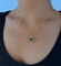 Collier pendentif en pierre ronde verte OEM collier de bijoux de couple en acier inoxydable or