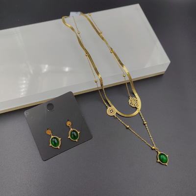 Les dernières boucles d'oreilles en acier inoxydable couleur or, collier, bracelet avec pierre verte pour dame