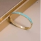 Les marques de luxe ont émaillé le bracelet bleu d'acier inoxydable d'or du bracelet 24k de boucle d'amour