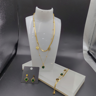 Les dernières boucles d'oreilles en acier inoxydable couleur or, collier, bracelet avec pierre verte pour dame