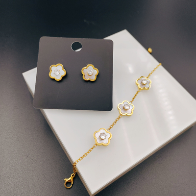 Nouvelle arrivée à la mode High Polish La plus récente couleur dorée Boucle d'oreille en acier inoxydable, Collier, Bracelet avec coquille pour dame