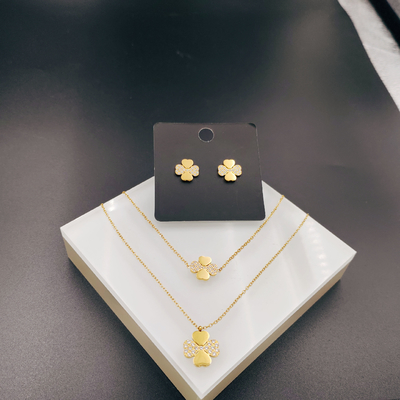 Nouvelle arrivée à la mode High Polish la plus récente couleur or boucle d'oreille en acier inoxydable, collier, bracelet ensemble avec Zirco pour la dame