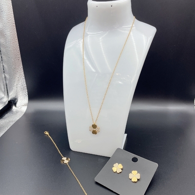 Nouvelle arrivée à la mode High Polish la plus récente couleur or boucle d'oreille en acier inoxydable, collier, bracelet ensemble avec Zirco pour la dame