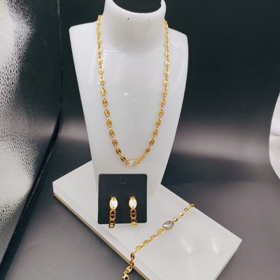 Nouveau arrivée Les dernières lignes tendance Couleur or Boucle d'oreille en acier inoxydable, Collier, Bracelet pour femme