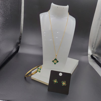 Les dernières boucles d'oreilles en acier inoxydable couleur or, collier, bracelet avec pierre verte pour dame