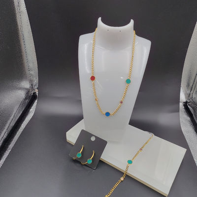 Les dernières boucles d'oreilles en acier inoxydable de couleur or, collier, bracelet avec coquille verte pour dame