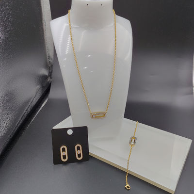 Les dernières boucles d'oreilles en acier inoxydable de couleur or, collier, bracelet avec coquille pour femme