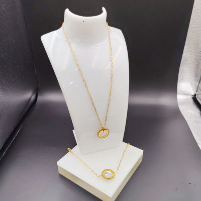 Nouvelle arrivée à la mode High Polish La plus récente couleur dorée Boucle d'oreille en acier inoxydable, Collier, Bracelet avec coquille pour dame