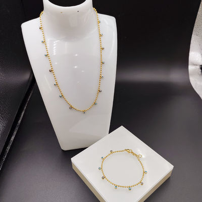Nouvelle arrivée à la mode High Polish La plus récente couleur dorée Boucle d'oreille en acier inoxydable, Collier, Bracelet pour Dame