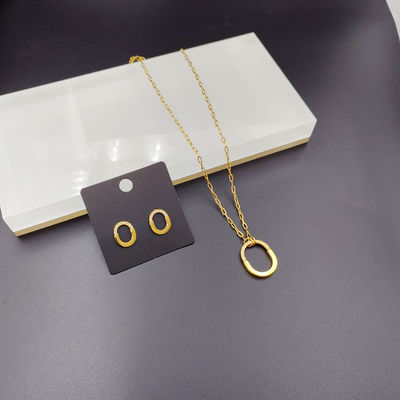 Nouveau arrivée Les dernières lignes tendance Couleur or Boucle d'oreille en acier inoxydable, Collier, Bracelet pour femme